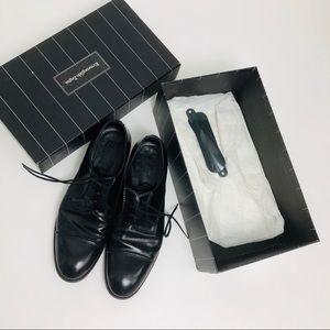 Men’s leather cap toe dress shoes.